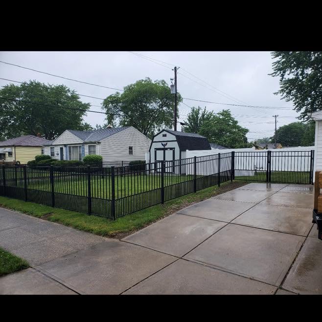 Black aluminum fence installed by Kolis Brothers